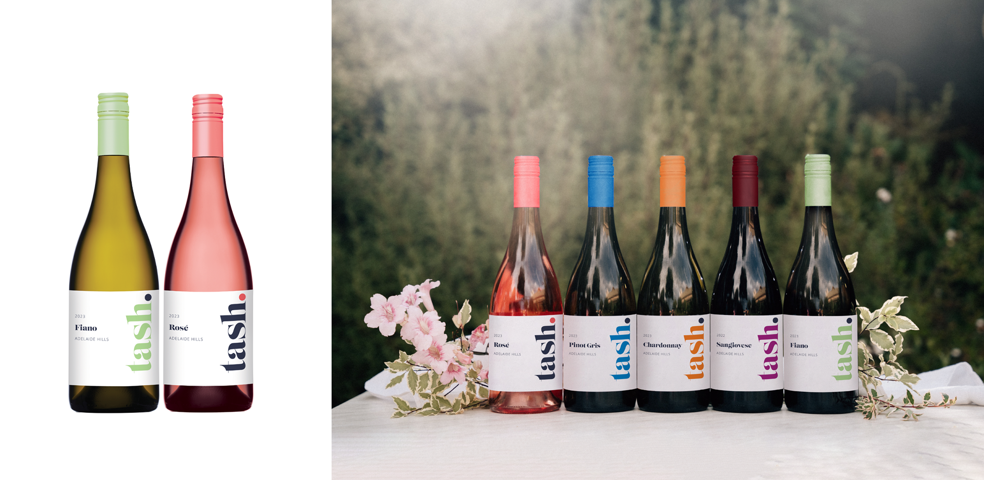 Two wine bottles on the left with white labels and colorful caps, one white and one pink. On the right, six bottles of wine lined up with white labels and different colored caps. They are on a table with pink flowers and greenery in the background.